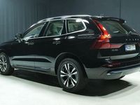 Käytetty Volvo XC60 Plus 350 HP (257 kW) 2023 Musta Katumaasturi