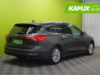 Käytetty Ford Focus Titanium 125 HP (91 kW) 2019 Hopea / harmaa Farmari