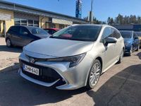 käytetty Toyota Corolla Touring Sports 1,8 Hybrid Style ** 1-Om. Suomi-auto / Merkkihuollot / Navi / Puolinahat / Lohko / Lämmitettävä ratti **