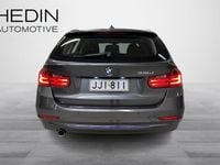 Käytetty BMW 318 Sport Line 143 HP (105 kW) 2014 Harmaa Farmari