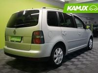 Käytetty VW Touran Trendline 140 HP (102 kW) 2009 Hopea / harmaa Tila-auto