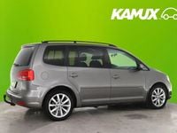 Käytetty VW Touran Comfortline 105 HP (77 kW) 2011 Hopea / harmaa Tila-auto