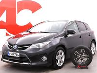 Käytetty Toyota Auris Hybrid Active 99 HP (72 kW) 2015 Musta Viistoperä