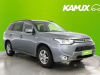 Käytetty Mitsubishi Outlander P-HEV Instyle 121 HP (88 kW) 2014 Hopea / harmaa Farmari