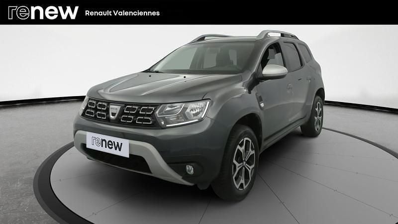 Gris Occasion 2021 Dacia Duster Prestige SUV | 15 499 € (Bon prix) - Image 1/4