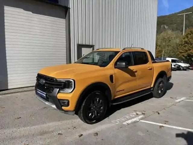 Cyber orange mã©tallisã©e Occasion 2025 Ford Ranger Wildtrack Pick-up | 48 999 € (Prix juste) - Image 1/4