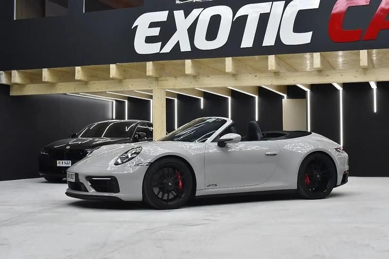 Gris Occasion 2024 Porsche 911 Carrera 4 Cabriolet Cabriolet | 179 900 € - Image 1/4