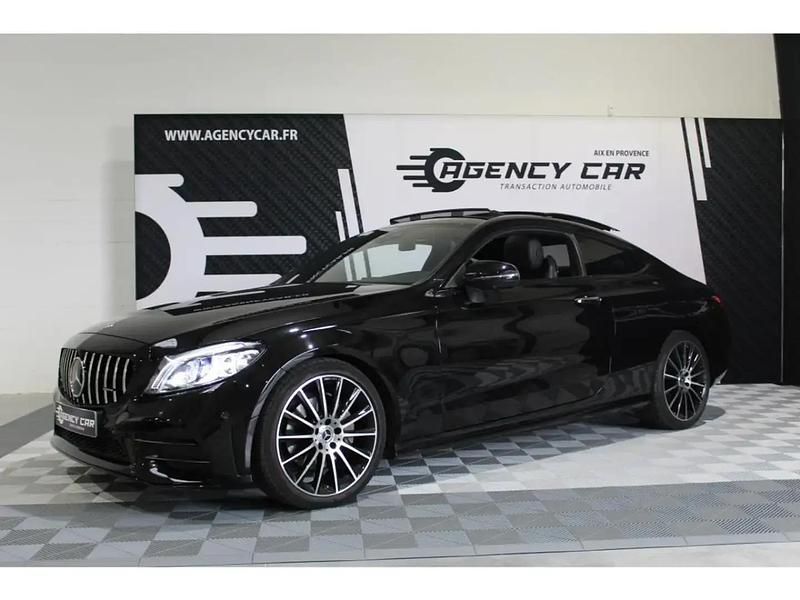 Noir Utilisé 2022 Mercedes C220 AMG line Coupé | 37 999 € (Prix juste) - Image 1/4