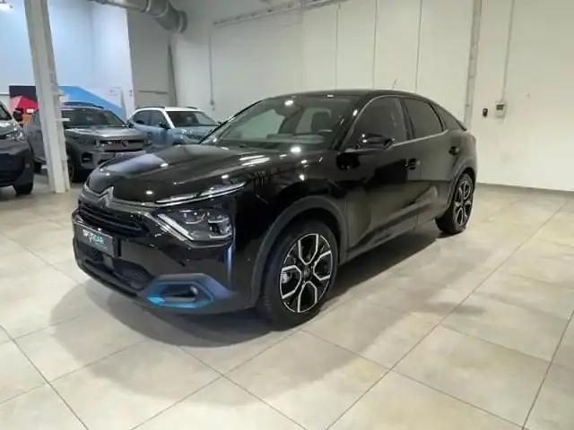 Noir perla nera (n) Occasion 2022 Citroën e-C4 Shine Berline | 18 878 € (Prix assez cher) - Image 1/4