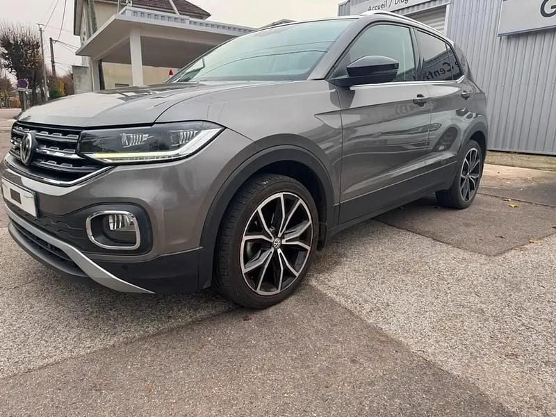 Gris Occasion 2019 VW T-Cross R-line SUV | 20 900 € (Prix juste) - Image 1/4