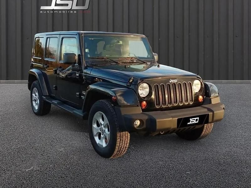 Noir Occasion 2013 Jeep Wrangler Sahara SUV | 30 990 € (Prix assez cher) - Image 1/4