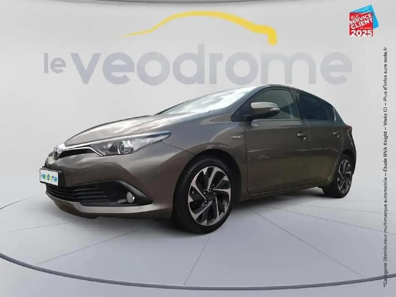 Gris Occasion 2019 Toyota Auris Hybrid Business Edition Berline | 16 999 € (Prix juste) - Image 1/4
