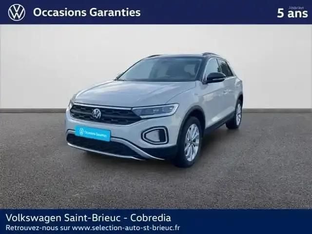 Gris ascot/toit noir Occasion 2025 VW T-Roc Life SUV | 26 990 € (Prix assez cher) - Image 1/4
