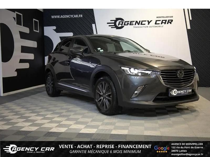 Gris Occasion 2018 Mazda CX-3 Signature SUV | 15 490 € (Bon prix) - Image 1/4