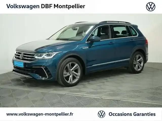 Bleu Occasion 2022 VW Tiguan R-line SUV | 35 880 € (Prix juste) - Image 1/4