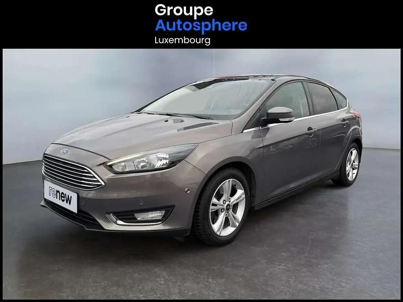 Gris Occasion 2016 Ford Focus Titanium Berline | 10 490 € - Image 1/4