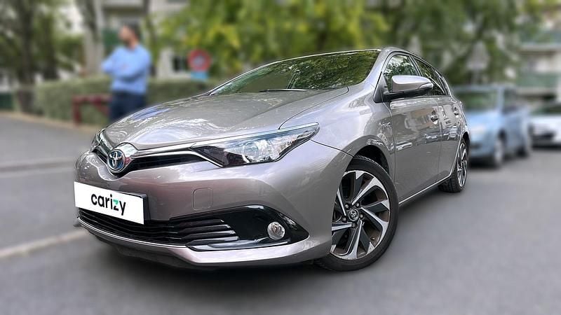 Gris Occasion 2016 Toyota Auris Hybrid Design Berline | 12 290 € (Bon prix) - Image 1/4