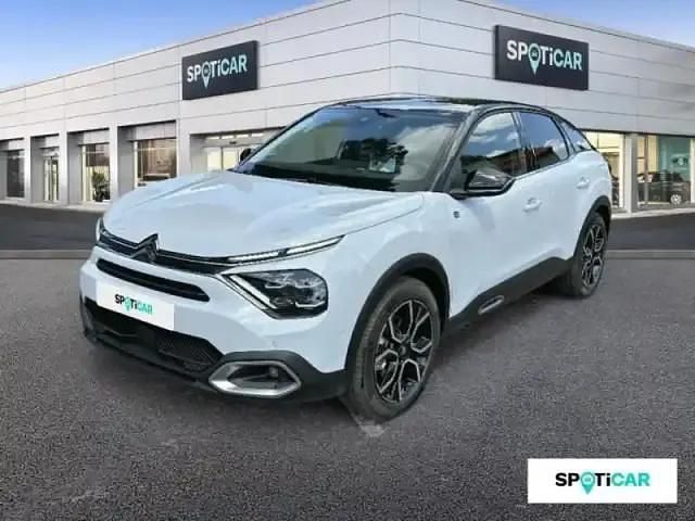 Blanc okénite (m) toit noir perla Utilisé 2024 Citroën e-C4 Berline | 26 900 € - Image 1/4