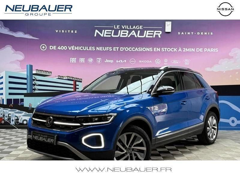 Bleu ravenna métallisée/toit noir Utilisé 2022 VW T-Roc Exclusive SUV | 28 780 € (Prix juste) - Image 1/4