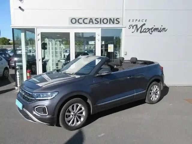 Gris cendre / capote noir Utilisé 2023 VW T-Roc Cabriolet Cabriolet | 29 990 € (Bon prix) - Image 1/4