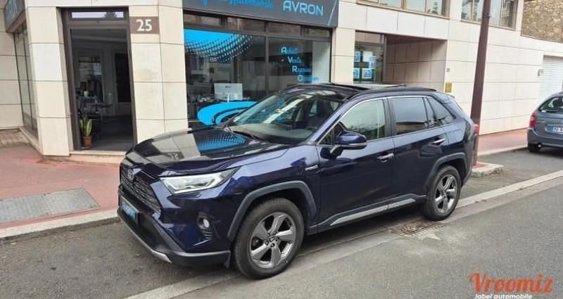 Bleu Occasion 2019 Toyota RAV4 Hybrid Lounge SUV | 26 990 € (Prix assez cher) - Image 1/4
