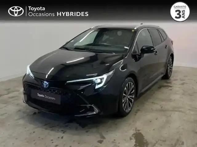 Noir intense métallisé Utilisé 2024 Toyota Corolla Design Break | 28 490 € (Prix juste) - Image 1/4