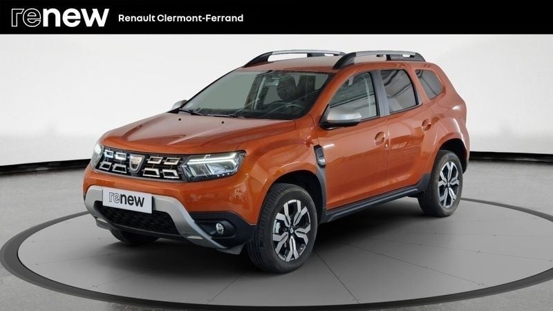 Orange Utilisé 2022 Dacia Duster Prestige SUV | 18 990 € (Prix juste) - Image 1/4