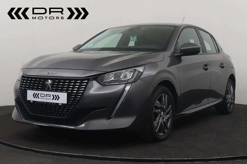 Gris Utilisé 2021 Peugeot 208 Active Citadine | 13 995 € (Prix juste) - Image 1/4