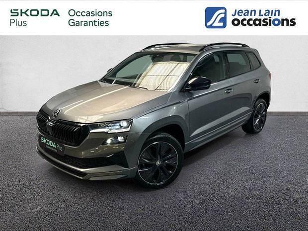 Gris Utilisé 2023 Skoda Karoq SportLine SUV | 31 490 € (Prix assez cher) - Image 1/4