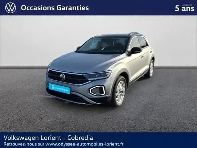 Gris pyrite métallisée/toit noir Occasion 2025 VW T-Roc Edition SUV | 30 990 € (Bon prix) - Image 1/4