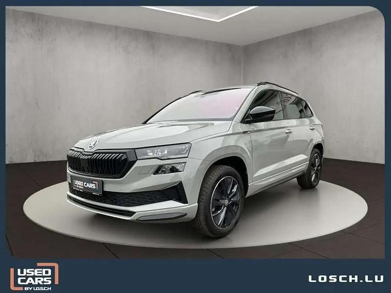 Gris Occasion 2024 Skoda Karoq SportLine SUV | 36 912 € (Prix juste) - Image 1/4