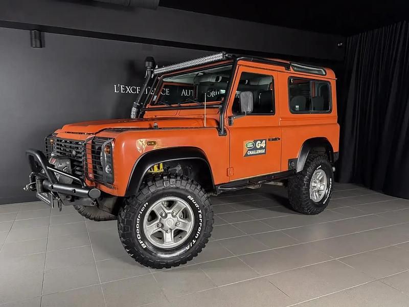 Orange Occasion 2004 Land Rover Defender Break | 44 900 € (Prix assez cher) - Image 1/4