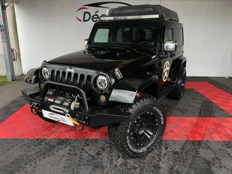 Noir Occasion 2014 Jeep Wrangler Sahara SUV | 31 990 € (Prix juste) - Image 1/4