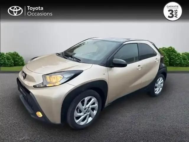 Biton beige gingembre métal/toit noir Occasion 2022 Toyota Aygo X Design SUV | 14 280 € (Prix juste) - Image 1/4