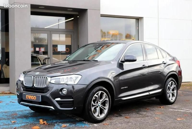 Gris Occasion 2015 BMW X4 xLine SUV | 21 990 € (Prix juste) - Image 1/4