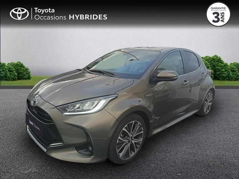 Bronze impérial (m) Occasion 2021 Toyota Yaris Hybrid Berline | 19 990 € (Prix assez cher) - Image 1/4