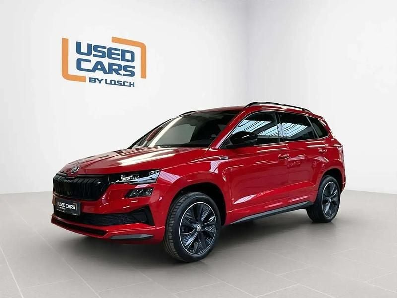 Rouge Occasion 2024 Skoda Karoq SportLine SUV | 35 887 € (Prix assez cher) - Image 1/4