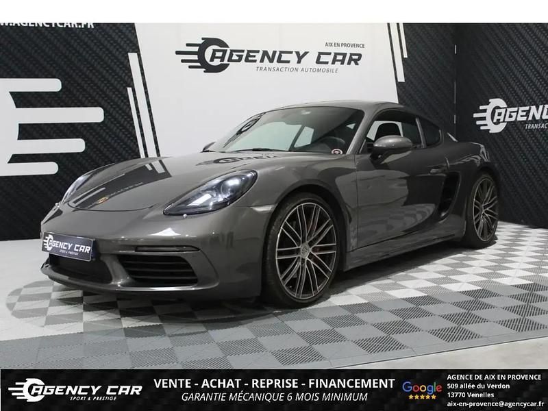 Gris Occasion 2018 Porsche 718 Cayman Coupé | 64 990 € (Prix juste) - Image 1/4