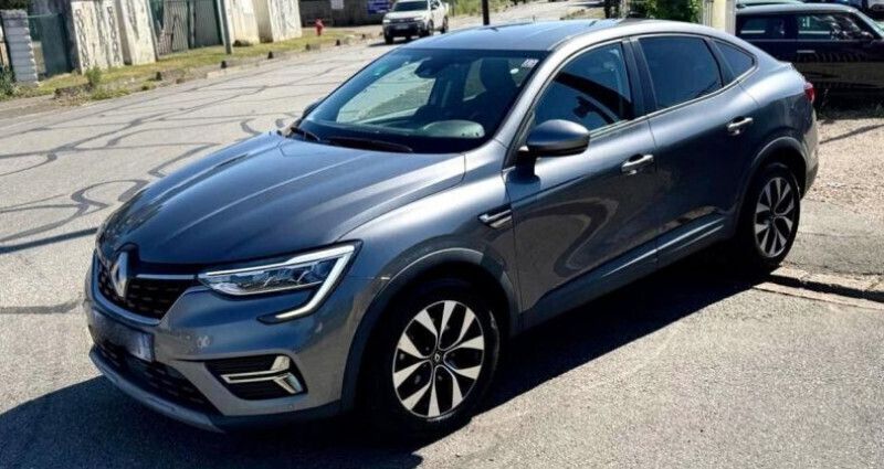 Gris Utilisé 2022 Renault Arkana Business SUV | 14 990 € - Image 1/4