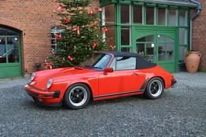 Rouge Occasion 1987 Porsche 911 Carrera Cabriolet Cabriolet | 65 900 € - Image 1/4