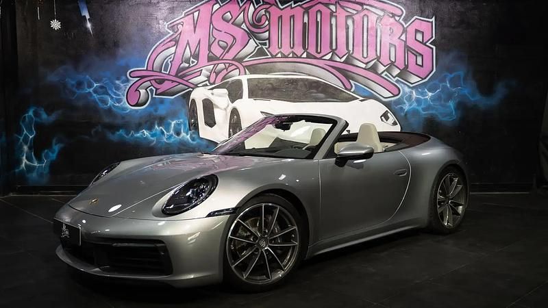 Gris Occasion 2024 Porsche 911 Carrera Cabriolet Cabriolet | 142 900 € (Prix juste) - Image 1/4