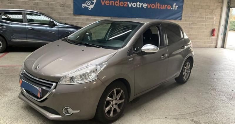 Brun Utilisé 2014 Peugeot 208 Envy Citadine | 5 290 € (Prix juste) - Image 1/4
