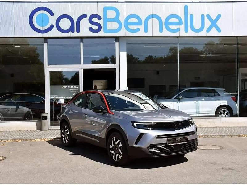 Gris Occasion 2023 Opel Mokka-e SUV | 21 950 € (Prix juste) - Image 1/4