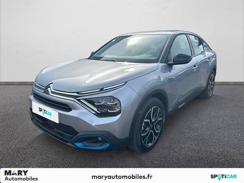 Gris Utilisé 2023 Citroën e-C4 Feel Berline | 19 990 € (Prix juste) - Image 1/4