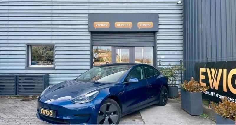 Bleu Occasion 2022 Tesla Model 3 Standard Range Berline | 21 980 € (Super prix) - Image 1/4
