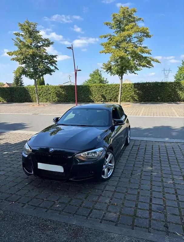 Noir Utilisé 2013 BMW 116 Sport Line Citadine | 8 790 € - Image 1/4