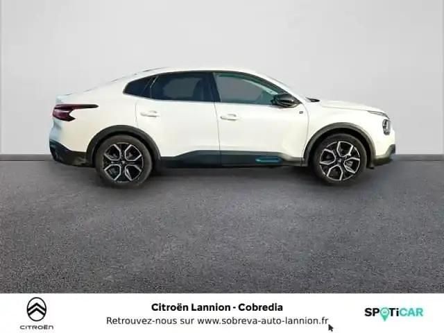 Occasion Citroën e-C4 Shine 11 kW (15 ch) 2023 Blanc nacré (n) Berline
