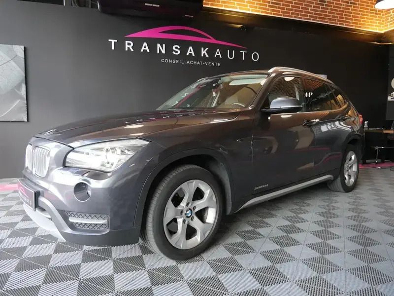 Gris Utilisé 2013 BMW X1 xLine SUV | 12 490 € (Prix juste) - Image 1/4