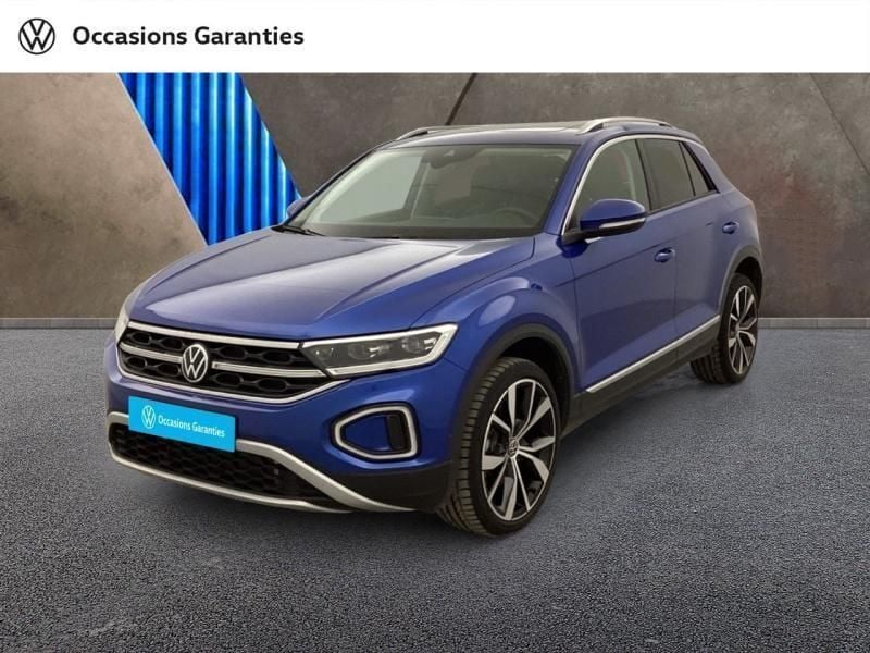 Bleu ravenna métallisée Utilisé 2024 VW T-Roc Exclusive SUV | 36 900 € (Prix cher) - Image 1/4