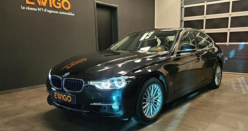 Noir Utilisé 2016 BMW 330e Luxury Line Berline | 19 990 € (Prix juste) - Image 1/4